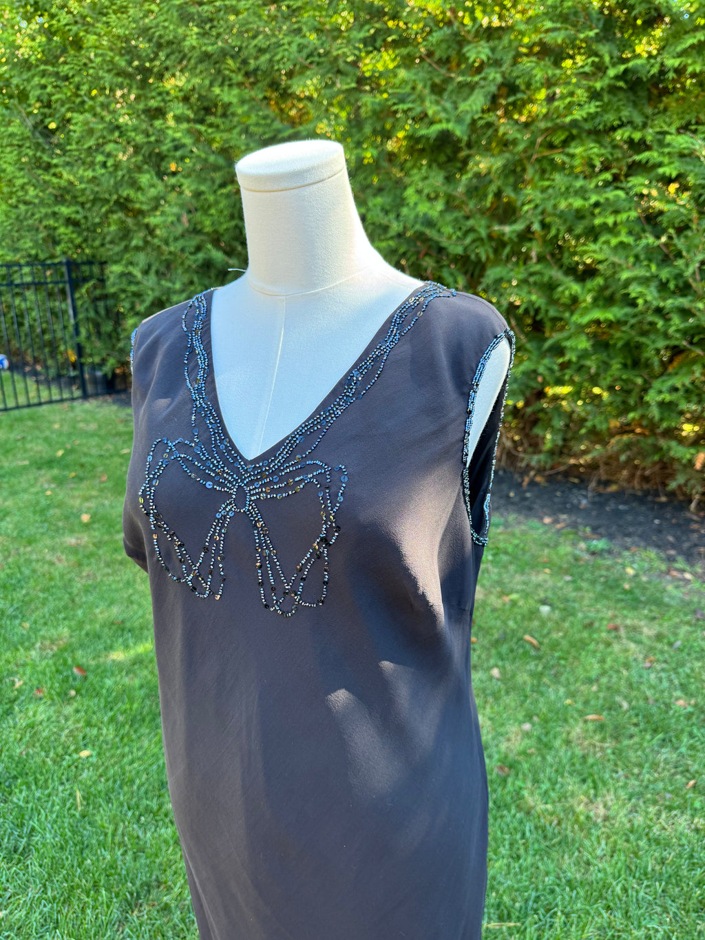 1990s 100% silk bias cut black midi with bow sequin design